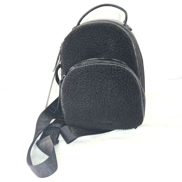Calvin Klein Astatine Sherpa Mini Backpack in Black - Picture 1 of 4